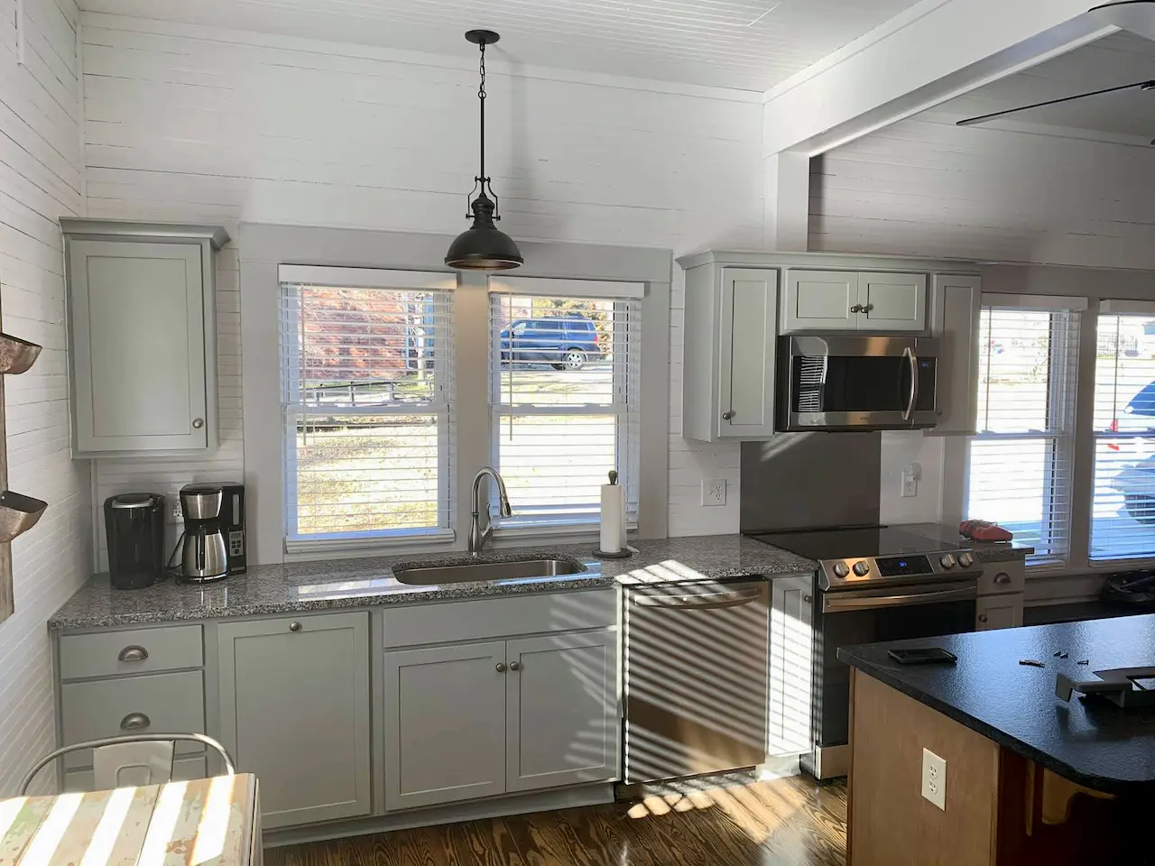Completed custom kitchen with island in a renovated home