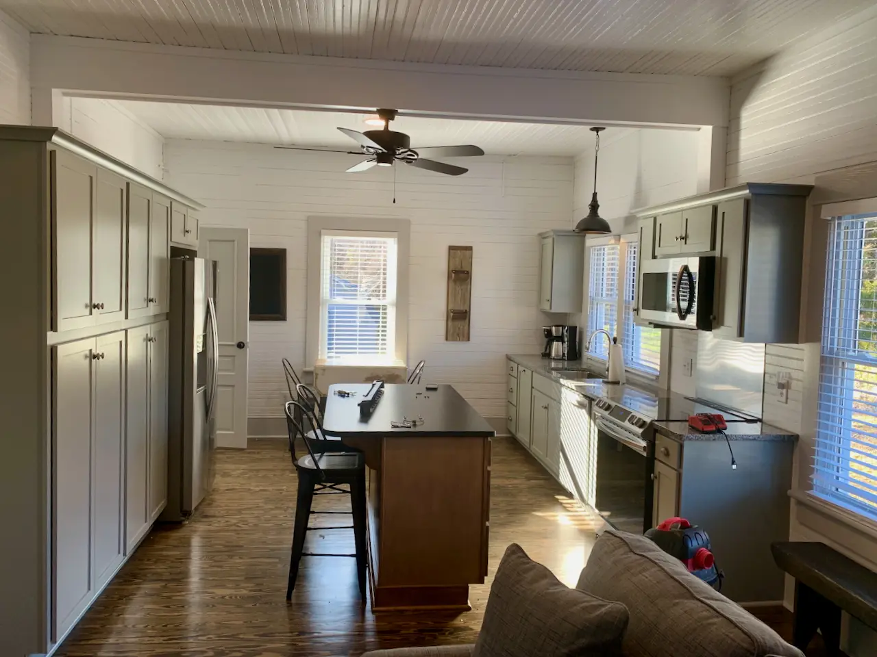 Completed kitchen and living space in a historic renovation